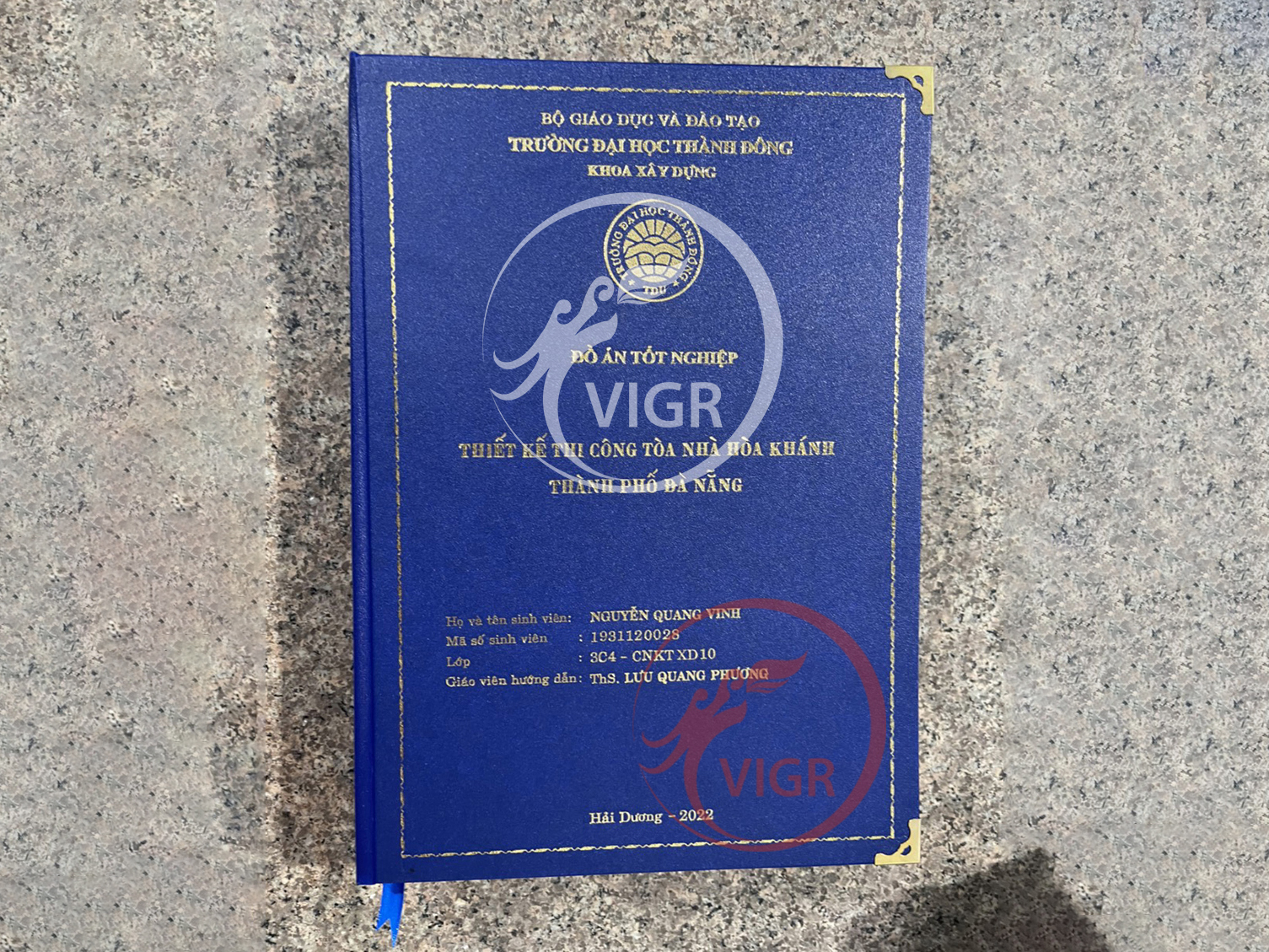 Bìa mạ vàng ĐH Thành Đông